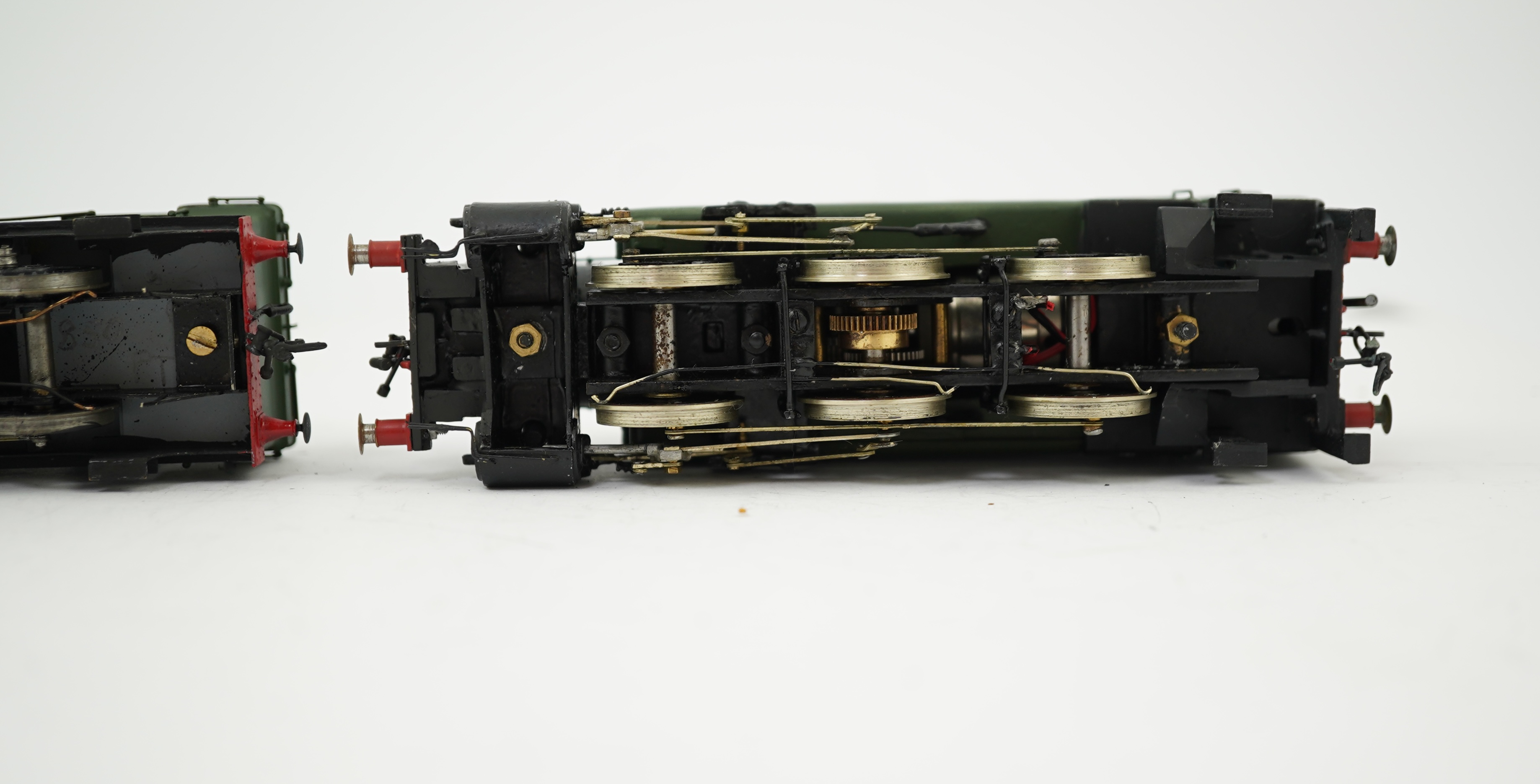 Three 00 gauge brass and white metal kit built GWR tank locomotives; a 15xx class 0-6-0T, 1500, together with an 54xx class 0-6-0PT, 5406, and a 19xx class 0-6-0PT, 1925, all constructed, painted and lined to a high stan